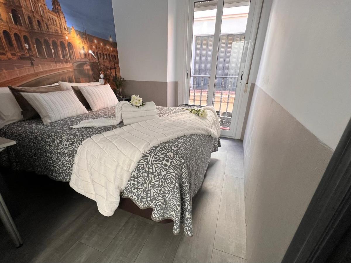 Hostal Paco'S Sevilla Dış mekan fotoğraf A bedroom in the hotel